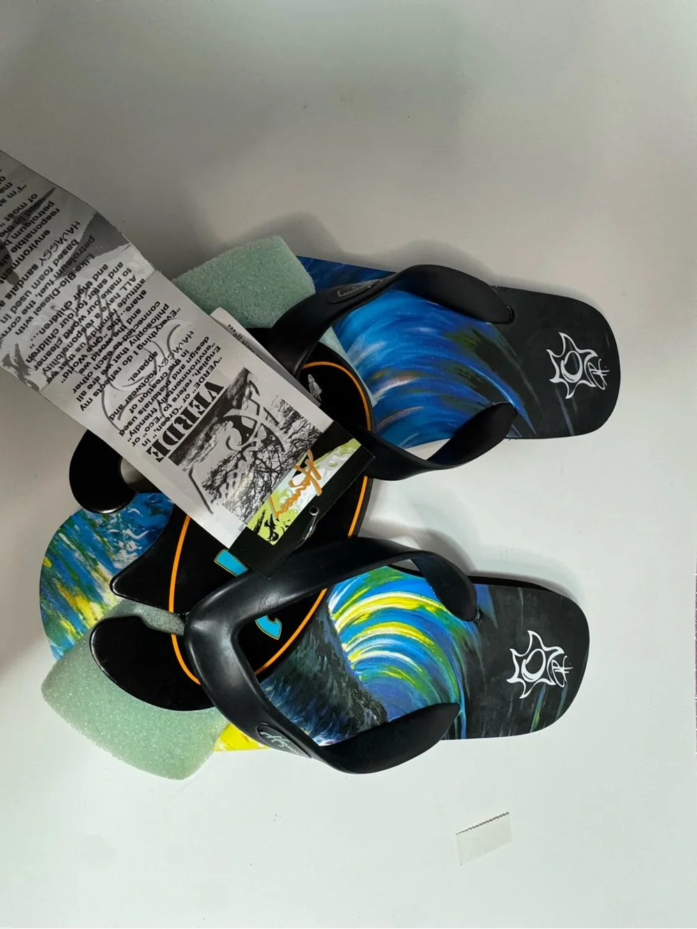 limited edition Havassy Verde WearableArt flip-flops featuring olive green strap